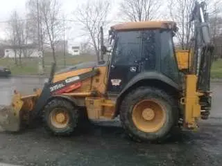 Аренда экскаватора-погрузчика John Deere 315SL с вилами